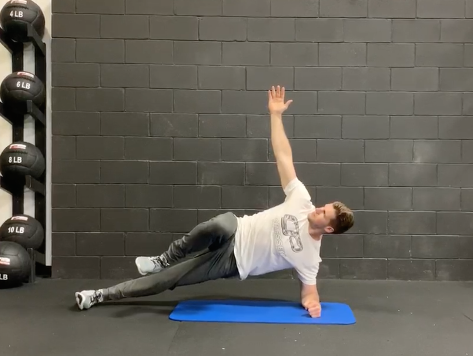 Exercise of the Week: Side Bridge with Top Leg March - EricCressey.com